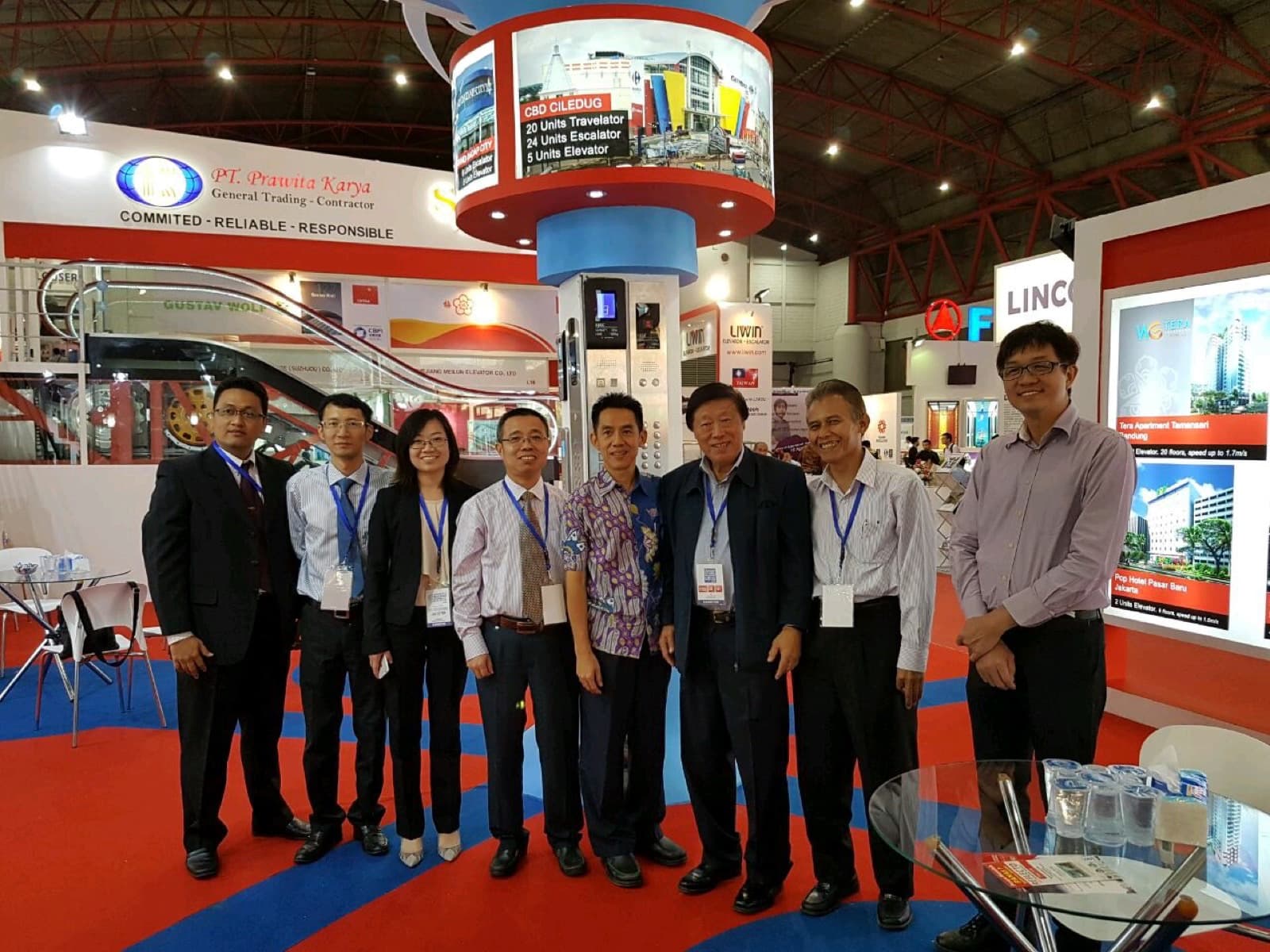 The Prawita Karya and SJEC team on the stand, in front of the project display listing Mall CBD Ciledug