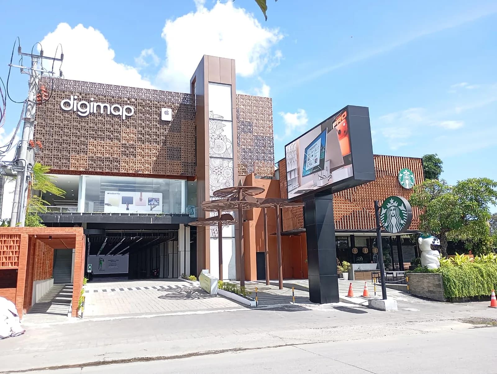 Street frontage of the Digimap store in Bali, with its perforated terracotta screen facade