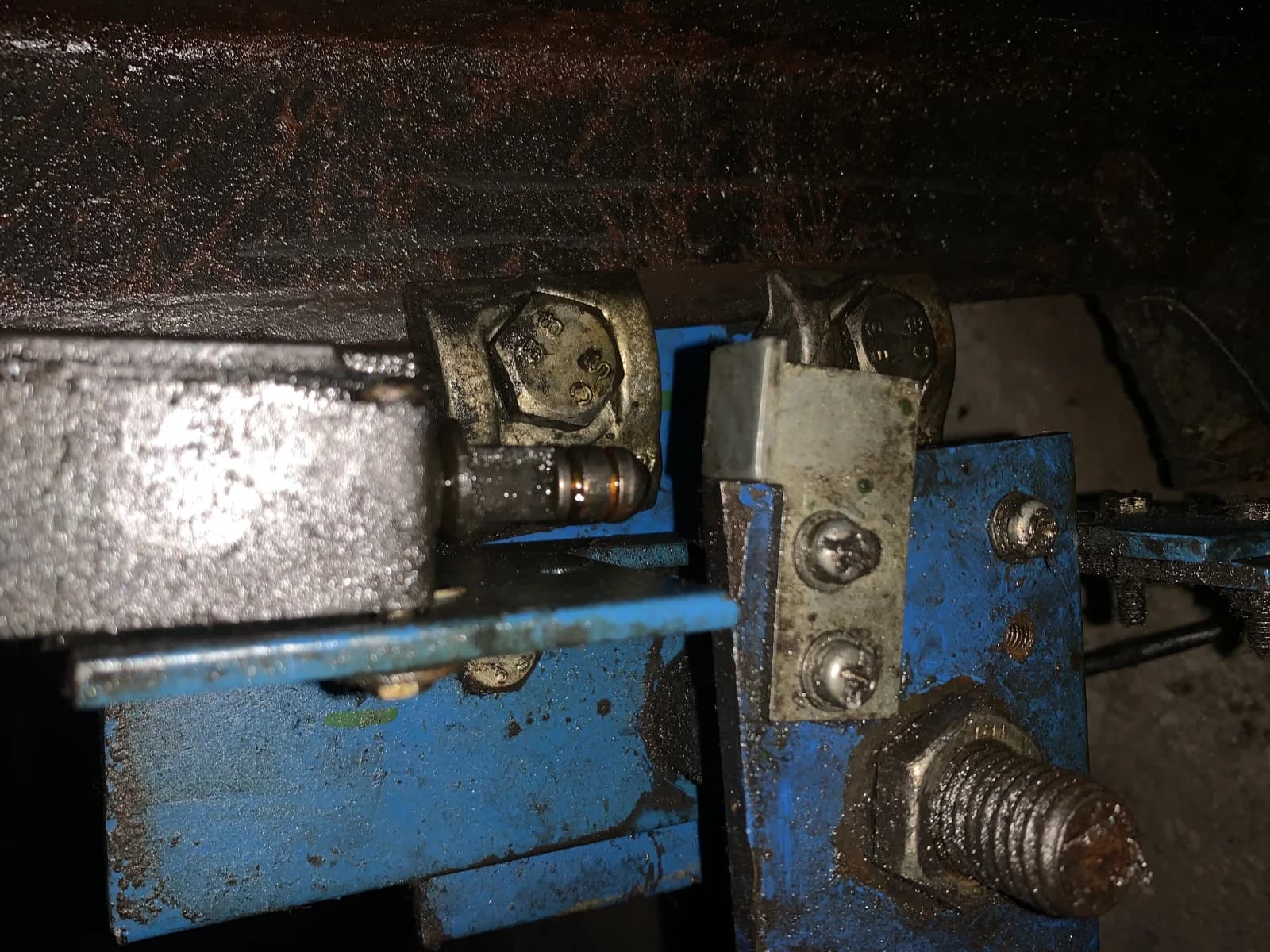 Elevator governor switch being inspected during scheduled maintenance