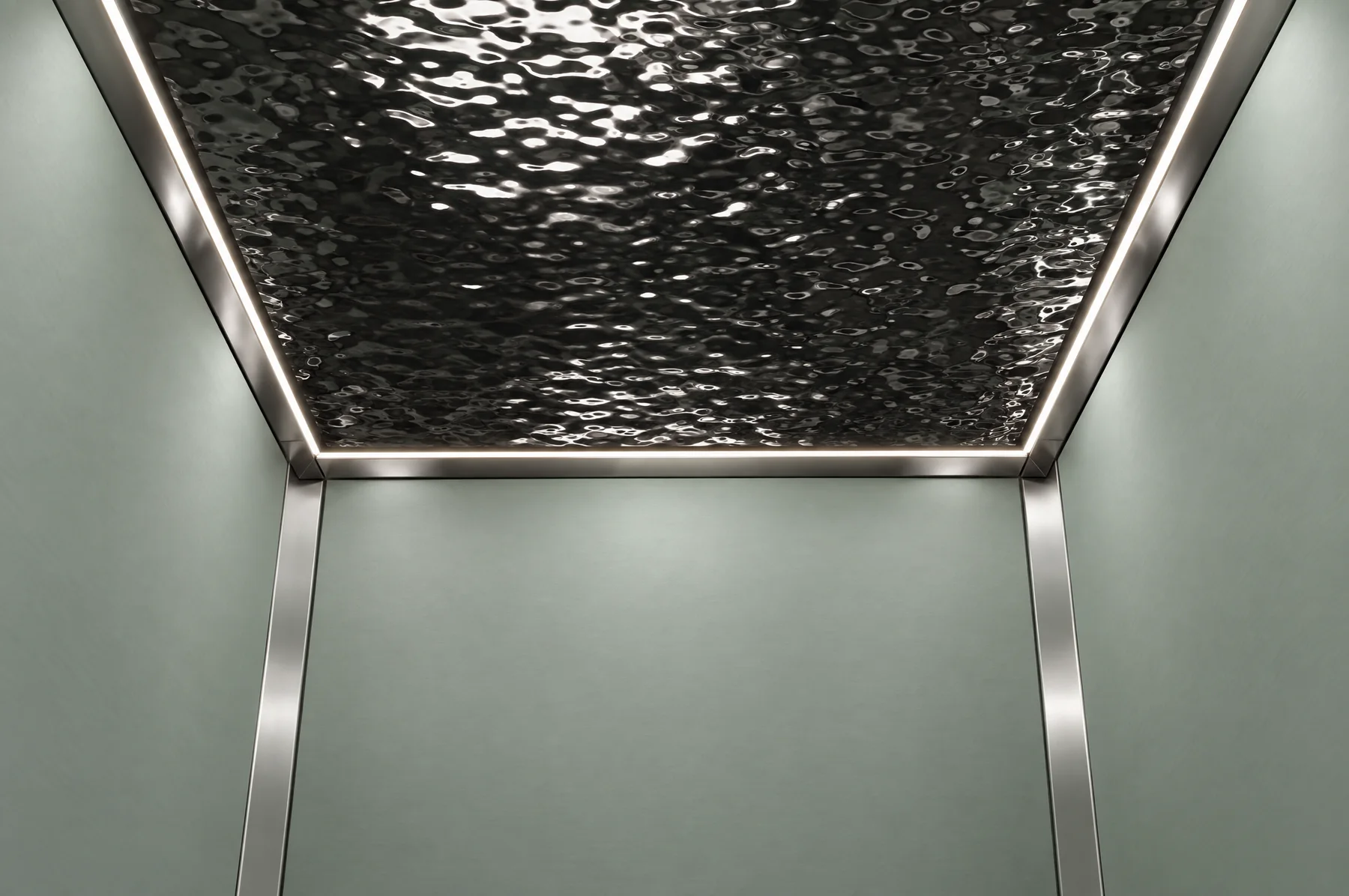Looking up inside the Tenkai Mizu car at the black water-ripple ceiling panel, the light strip running round its perimeter and the pale green walls below