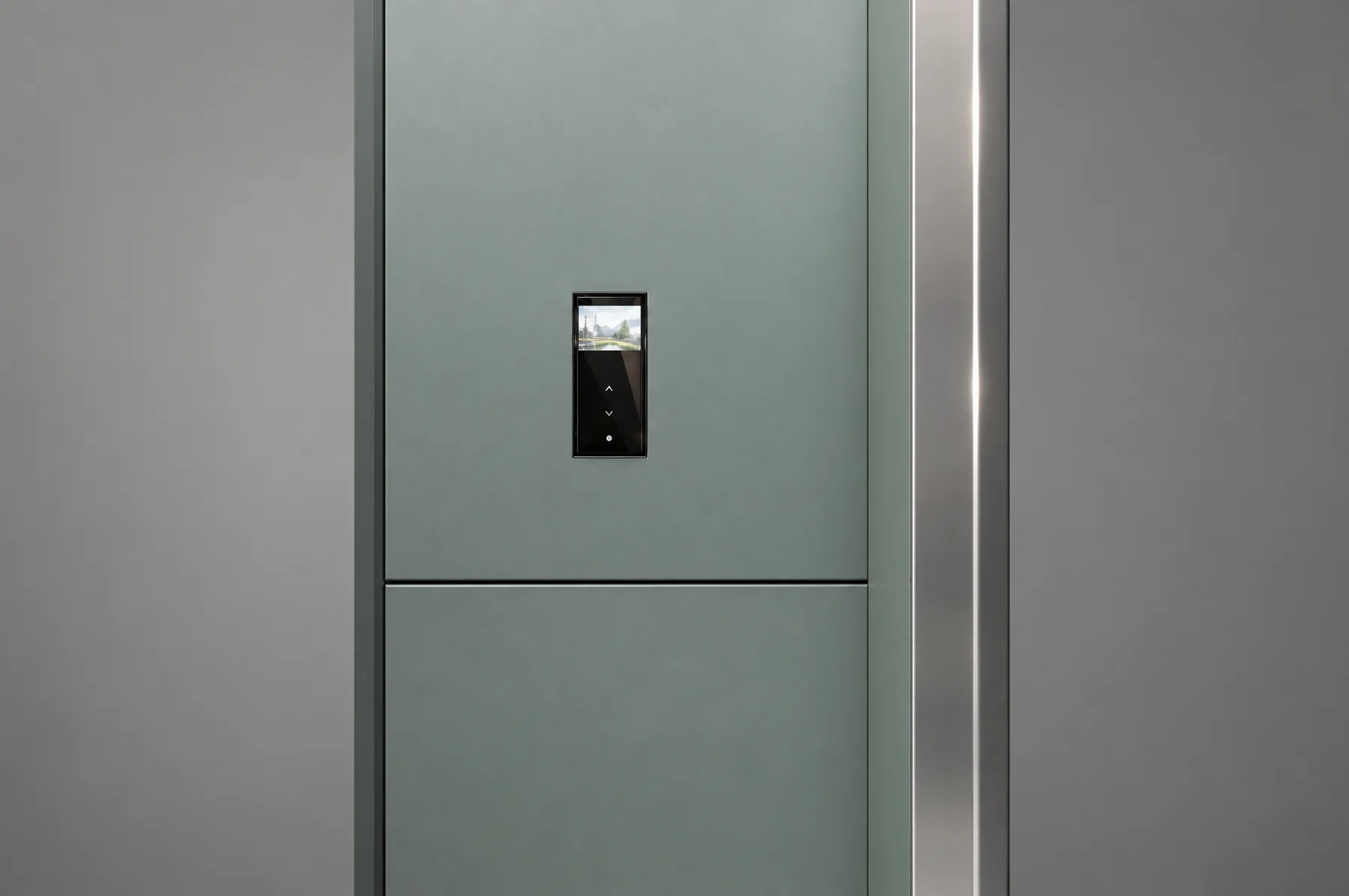 Close-up of the Tenkai Mizu car panel, a slim black glass plate with a small colour display set into the pale green wall beside the mirror stainless column